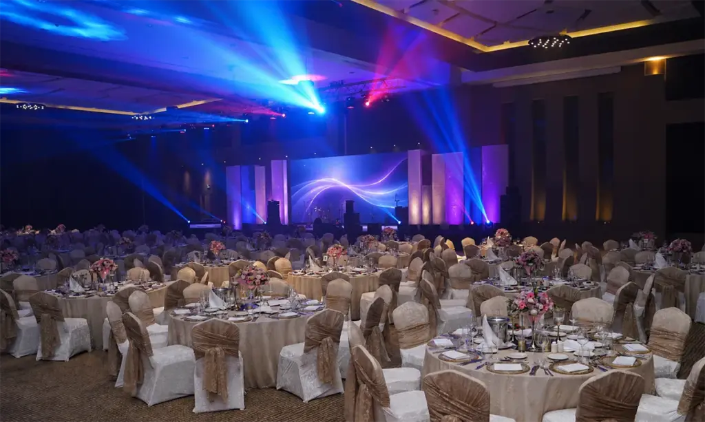 Corporate gala dinner ballroom with stage, lighting and AV production in Antalya